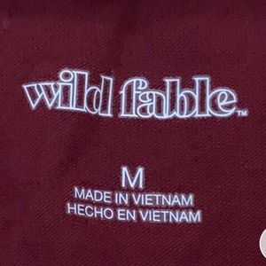 cute maroonish / red crop top, never worn it was just too big on me:(